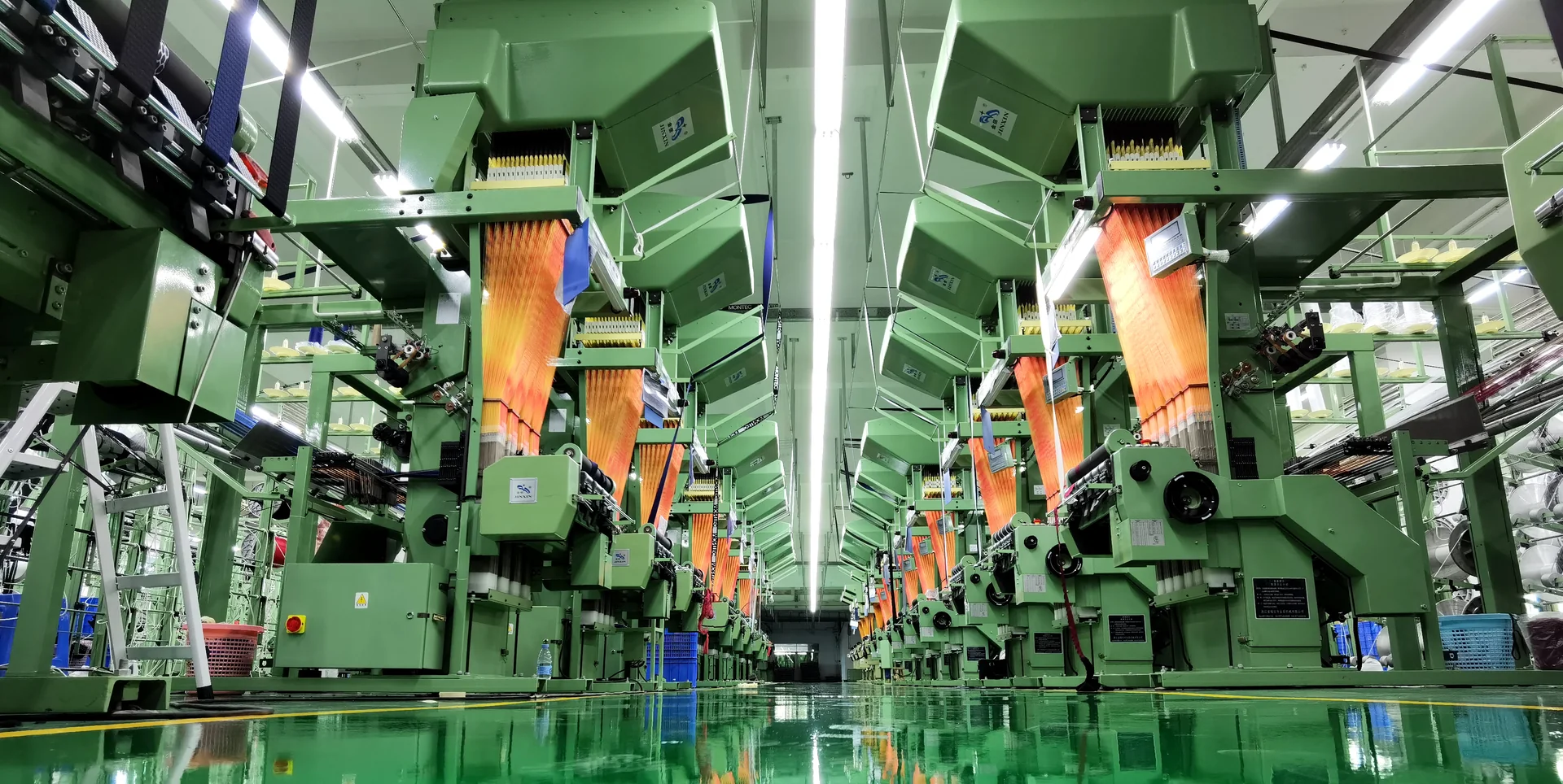 Machinery and yarns in the YCZD textile workshop